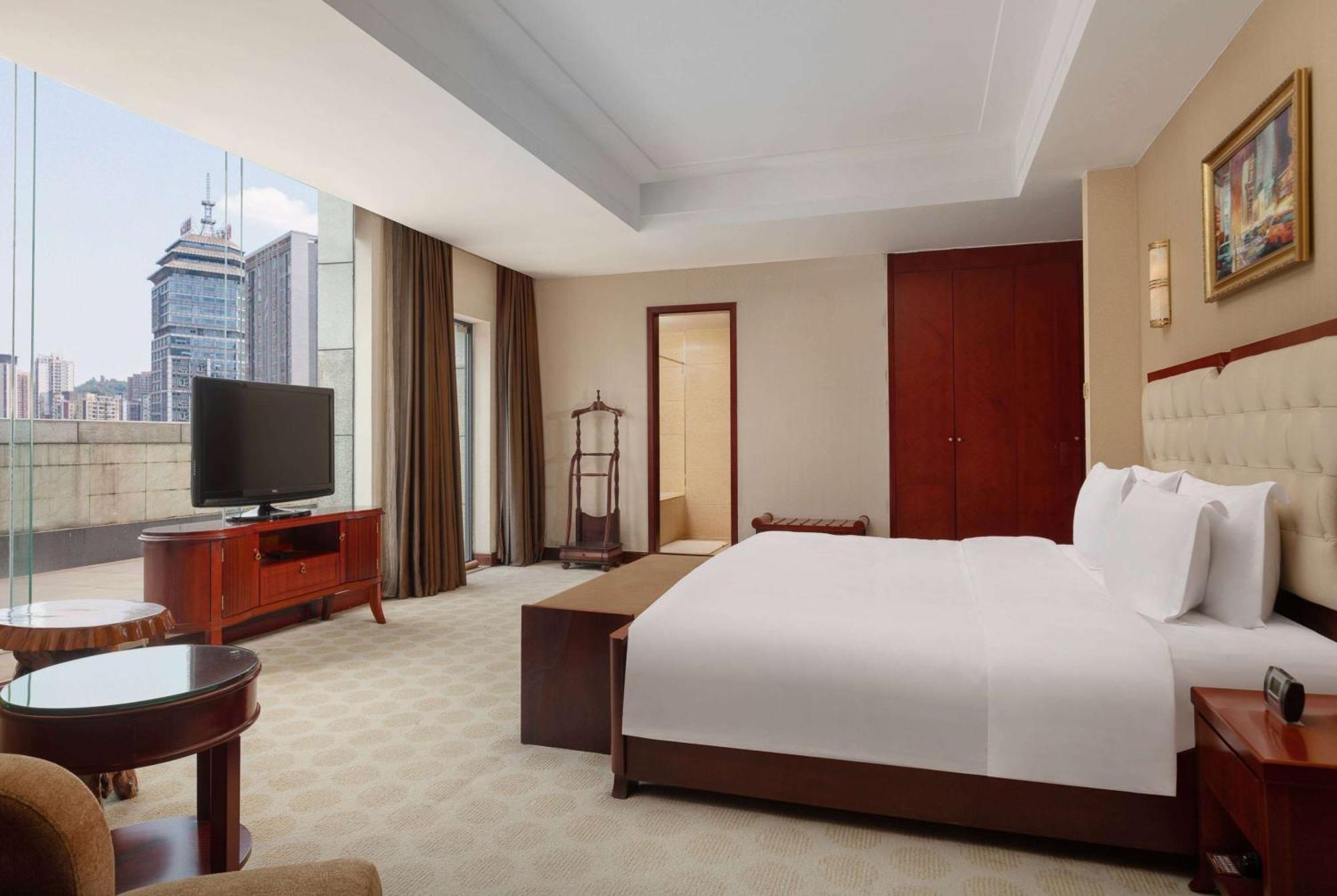 Ramada Plaza By Wyndham Chongqing West Hotel Exterior foto
