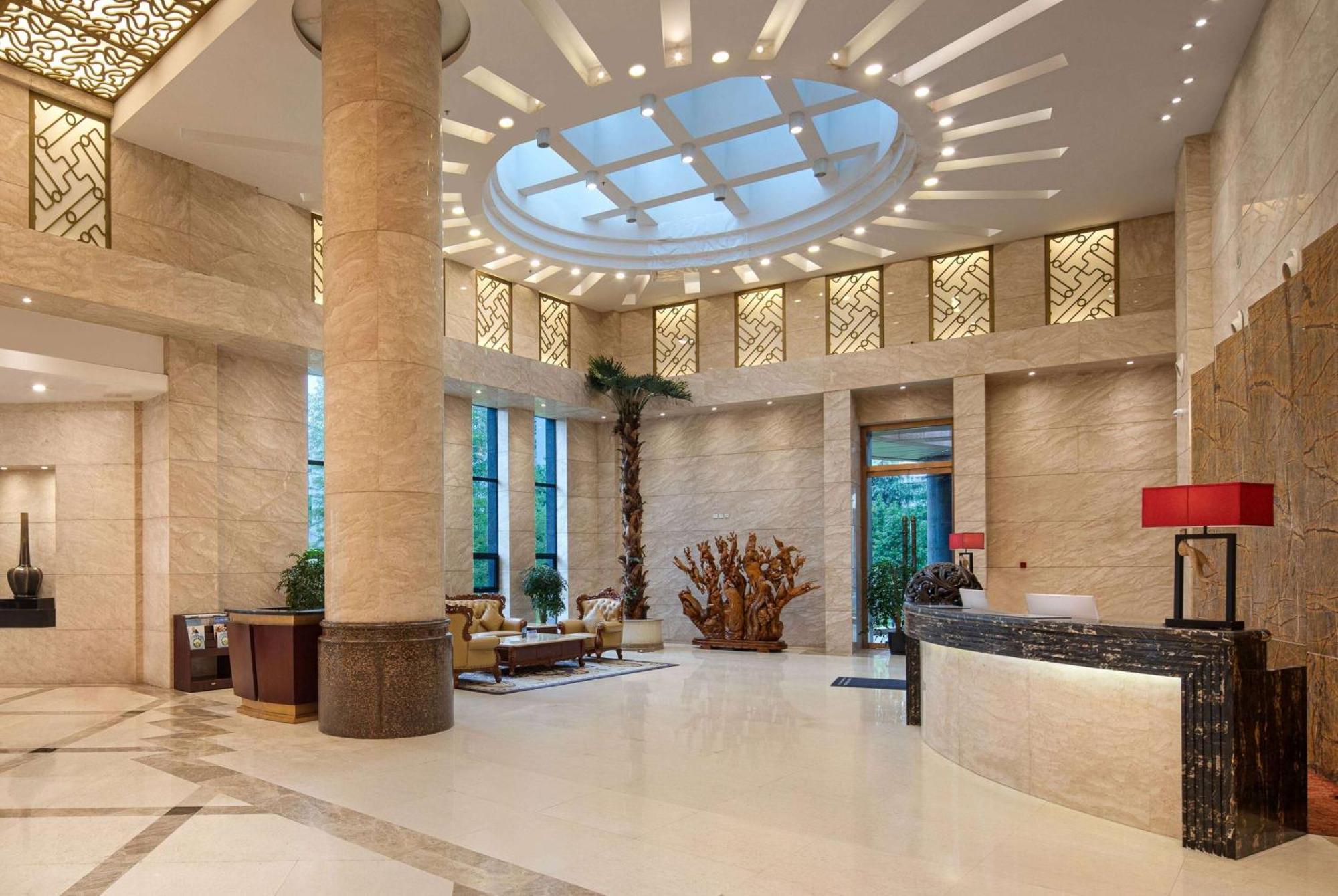 Ramada Plaza By Wyndham Chongqing West Hotel Exterior foto